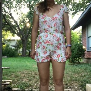 Pink and white floral romper